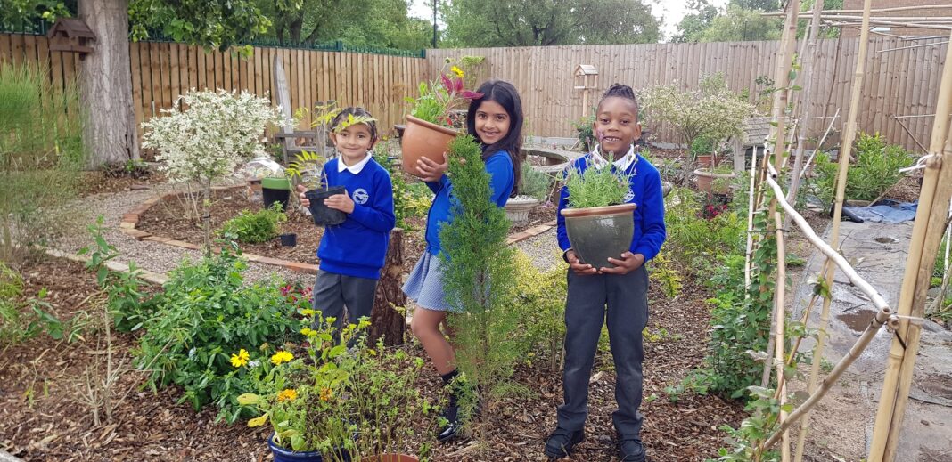 Pupils at Brookvale School in the new peace garden, which has been created during lockdown with help from across the UK.