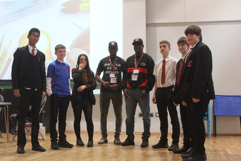 Dan Gardiner and Marcus Isaac of F2D with Year 10 students from Plantsbrook School.