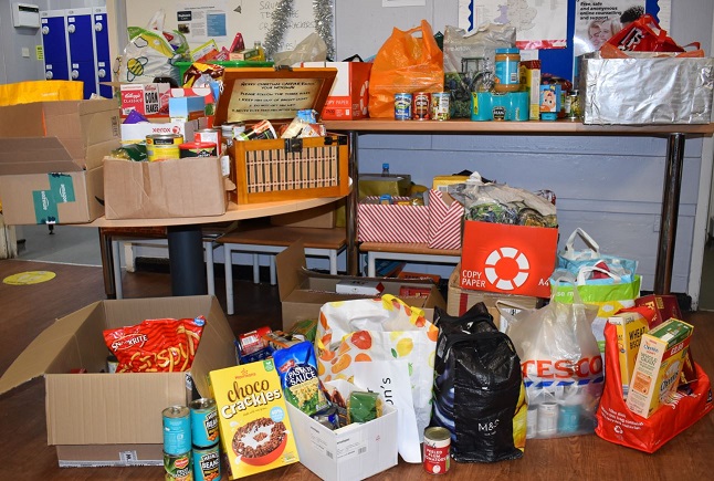 The donations gather at the school.