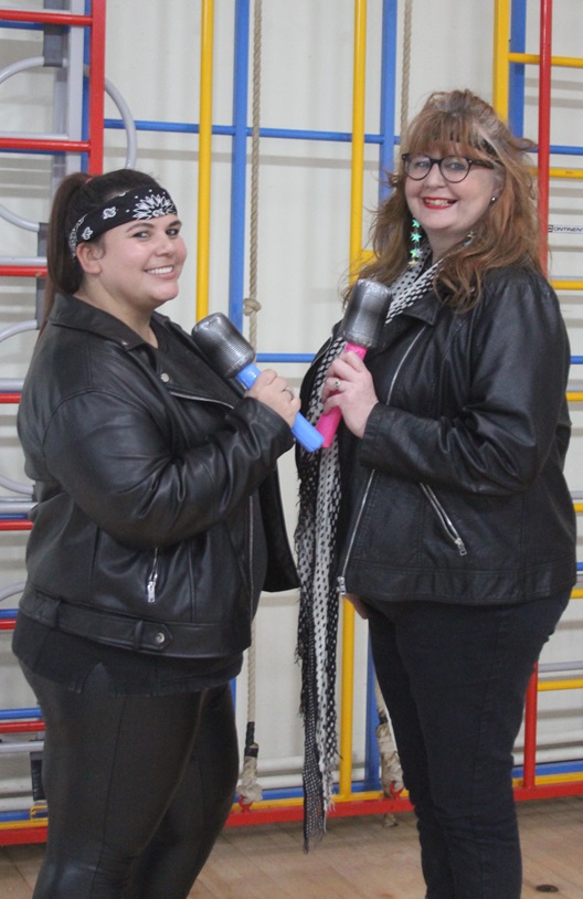 Teachers ready to rock in leather jackets.