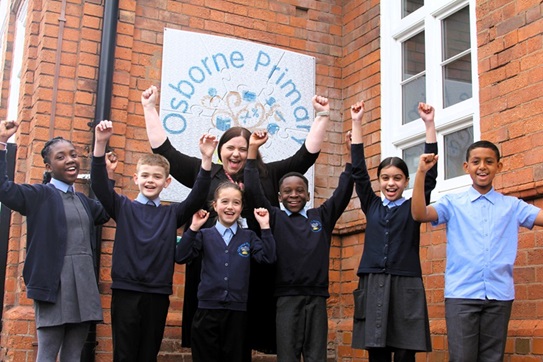 Osborne Primary Ofsted 2024 - Headteacher Lisa Dodd celebrates with Osborne pupils.