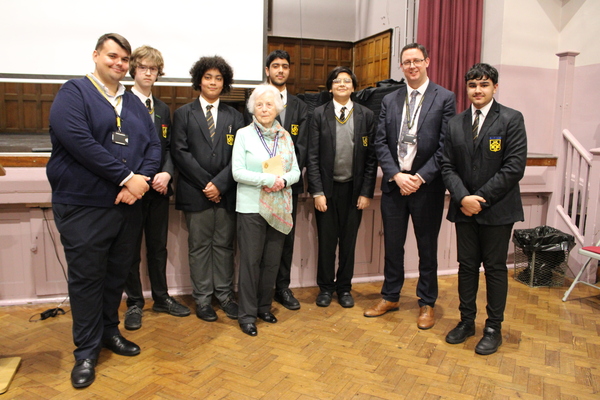 Dr Kaposi with students and staff from King Edward VI Handsworth Grammar School for Boys.